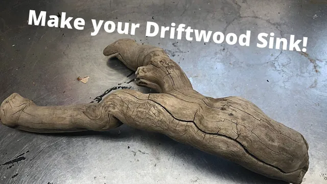 how to get driftwood to sink in aquarium
