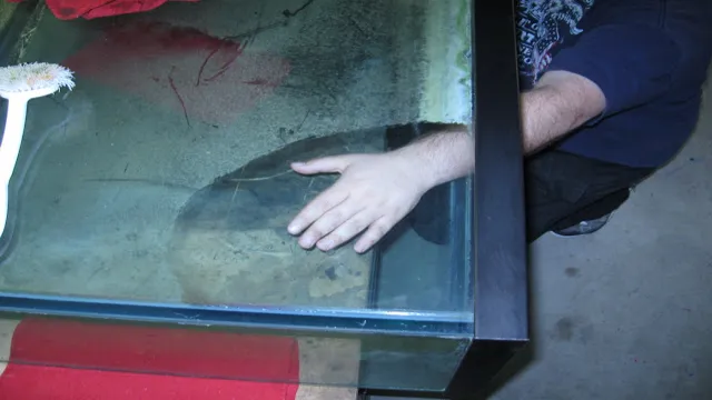 how to get hard water off aquarium glass