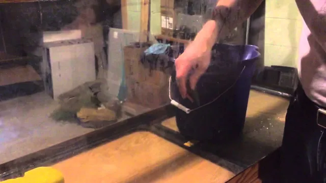 how to get hard water stains off of aquarium glass
