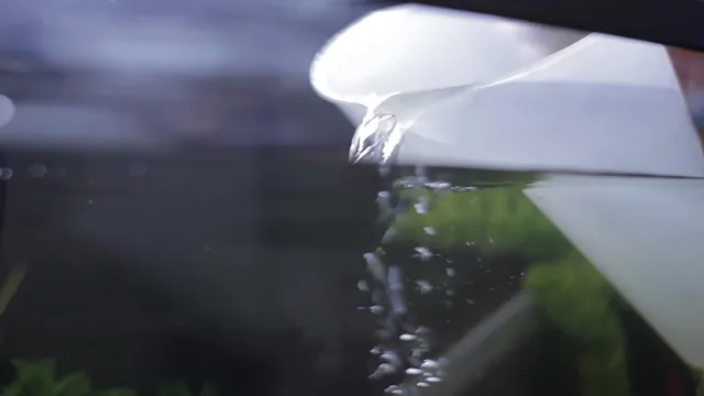 how to pour water into an aquarium