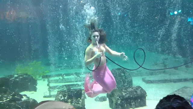 how to be a mermaid in an aquarium