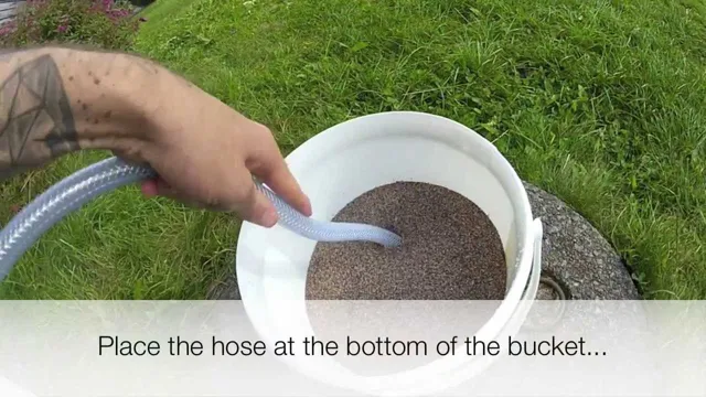 how to clean fish food out of aquarium sand